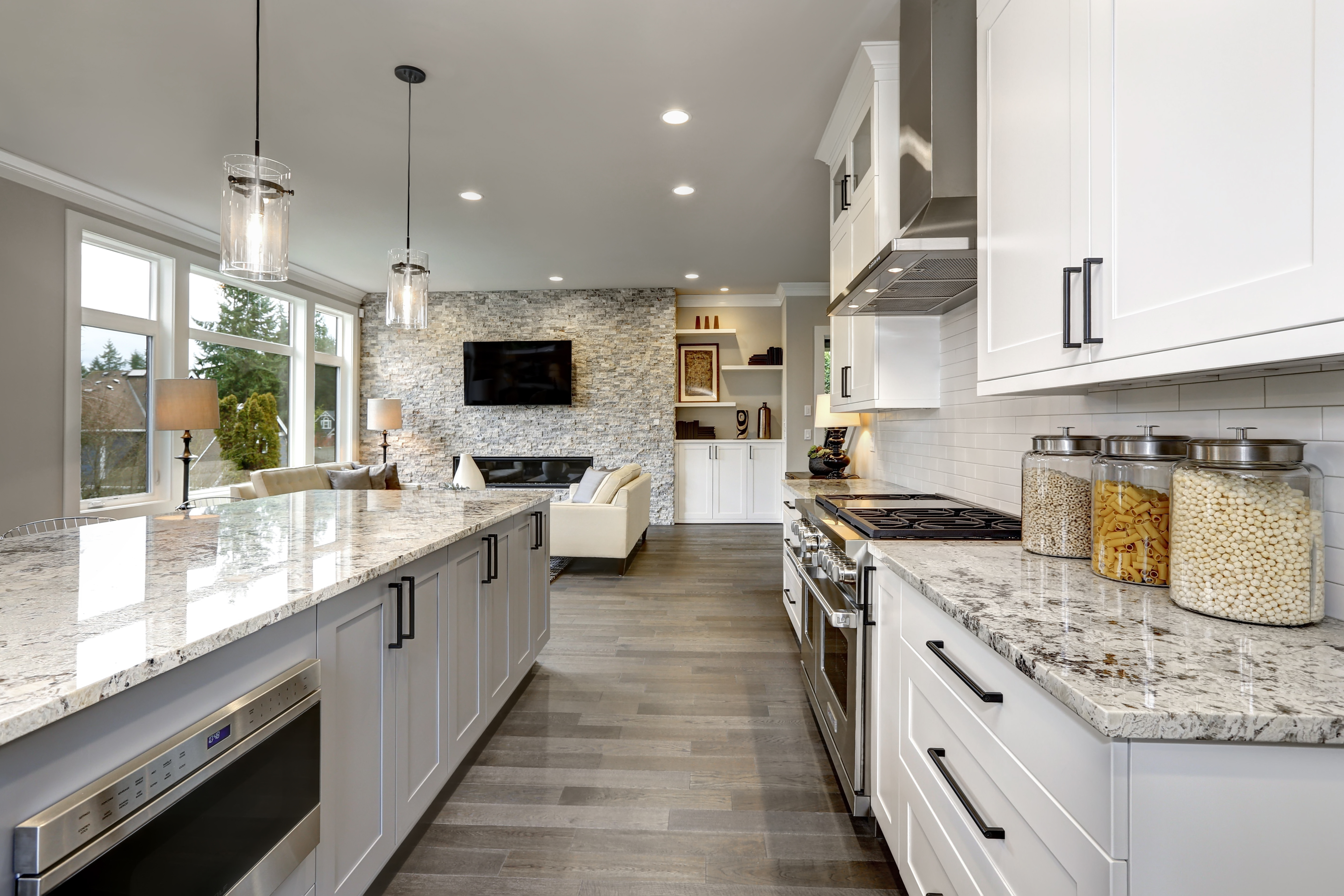 A bright open kitchen and living area after a clean
